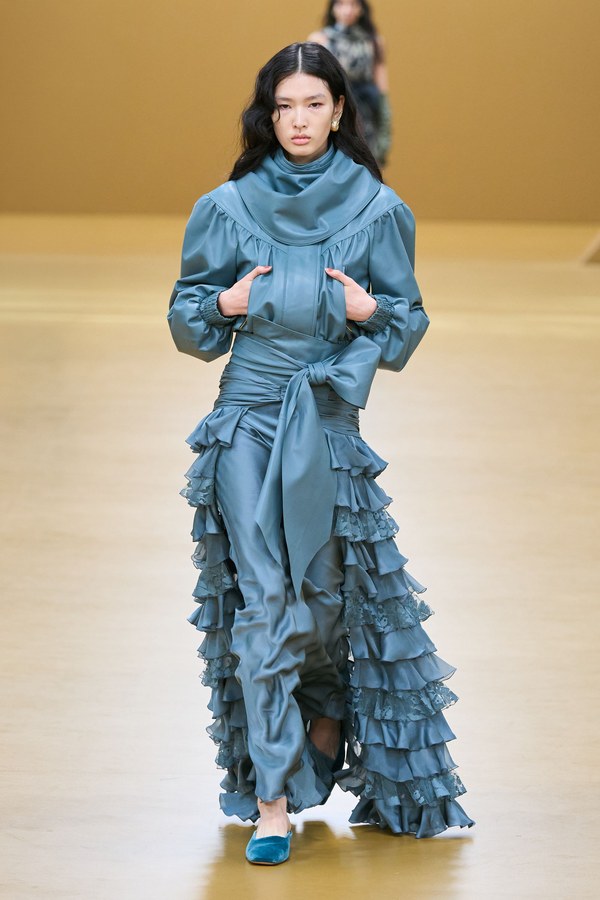 Zimmermann Fall 2026, look 31: blue-grey column skirt covered in about ten rows of lace-edged ruffles