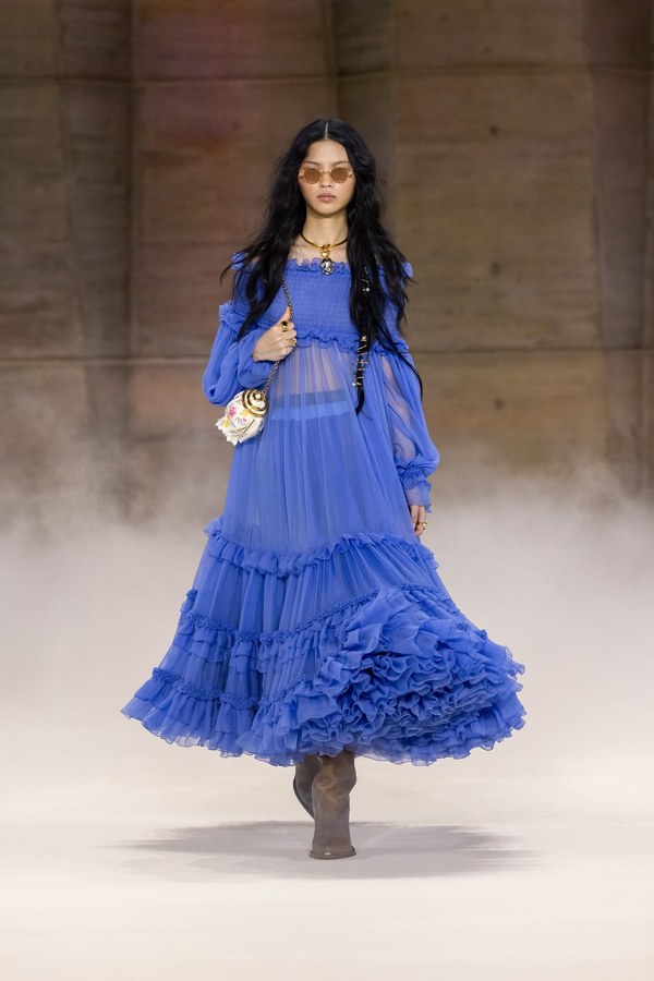 Chloé Fall 2026, look 14: periwinkle mousseline dress with gathered tiers and a ruffled hem