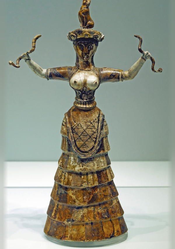 Minoan Snake Goddess figurine, c. 1600 BC, in a bell-shaped skirt of overlapping flounces